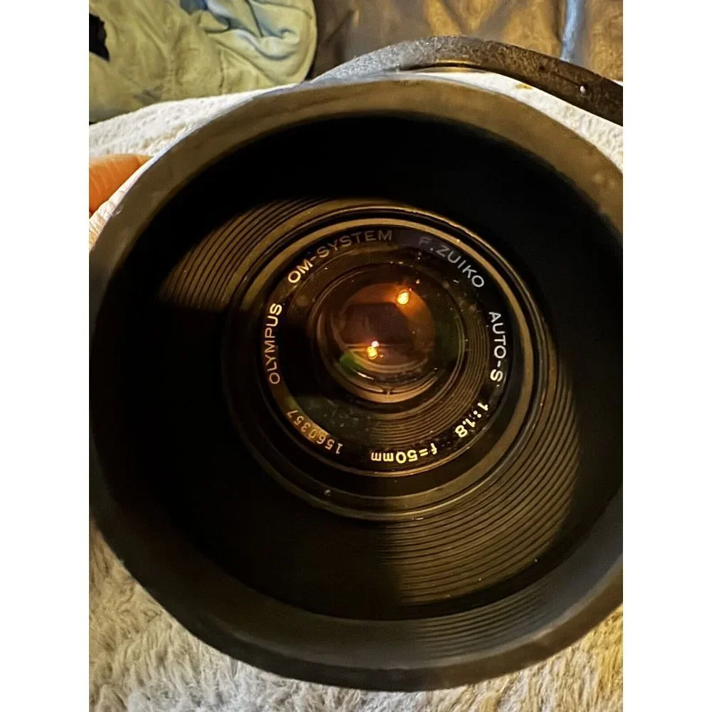 Olympus OM-1n Camera in Chrome With 50mm 1:1.8 Auto S Lens